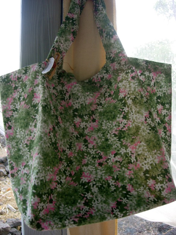 Green and pink floral shopping bag.